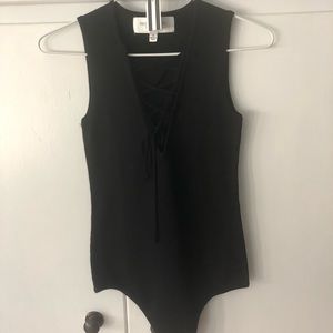 Black tie up body suit